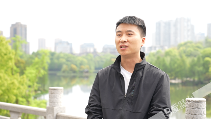 璧山区图书馆网络部主任李光川.jpg